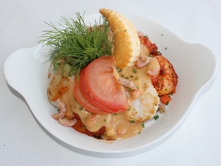 Scampi's en Coquilles in een kreeftensausje